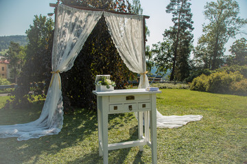 wedding ceremony in the open-air park with beautiful decorations