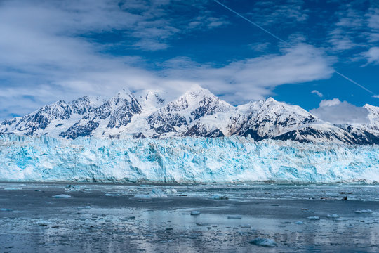 Amazing Hubbard Glacier. The View from the cruise ship in Alaska. Snow peaks and icebergs around.