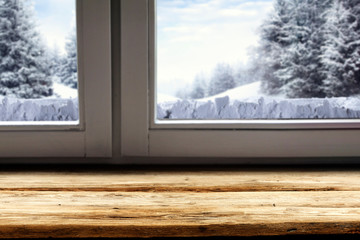 Window sill with snow and free space for your decoration 