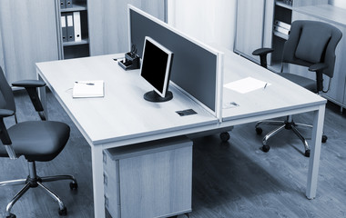 monitor on desk in a modern office