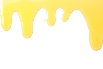 Flow of sweet honey isolated on white background