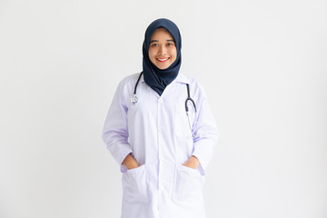 Young Arab Muslim intern doctor women smile on isolate white background concept for Islam people...