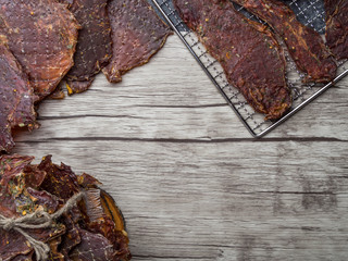 Dried or dehydrated meat slices on metal tray