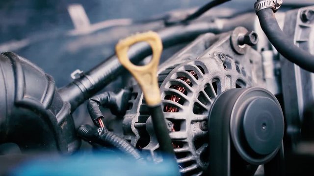 car generator belt, smoke from the engine - repair.