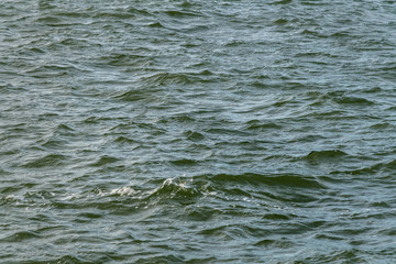 Surface of wavy water.