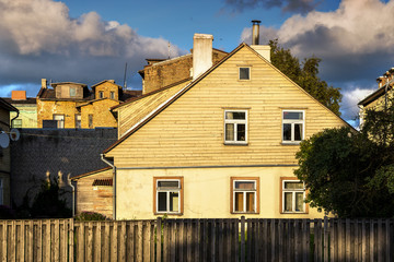 Wooden houses in evening.