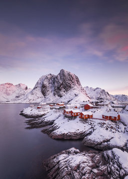 Red houses and beautiful mountain in Stunning Norway