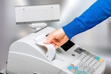 Cash register with LCD display on background