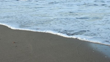 Sea water movement on a beach in Spain