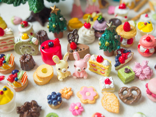 Merry Chrismas with a lot of miniature toys. Sweet party, dessert table toy concept.
