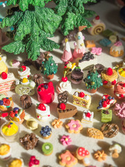 Merry Chrismas with a lot of miniature toys. Sweet party, dessert table toy concept.