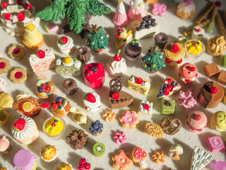 Merry Chrismas with a lot of miniature toys. Sweet party, dessert table toy concept.