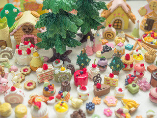 Merry Chrismas with a lot of miniature toys. Sweet party, dessert table toy concept.