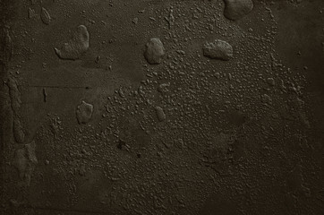 Urban concrete wall background with grooves and bubbles. Cement gray wall. Urban and industrialization art concept. Texture like concrete, stone, cement, plaster.. Poster mockup. Сloseup studio shot.