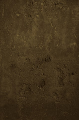 Urban concrete wall background with grooves and bubbles. Cement gray wall. Urban and industrialization art concept. Texture like concrete, stone, cement, plaster.. Poster mockup. Сloseup studio shot.