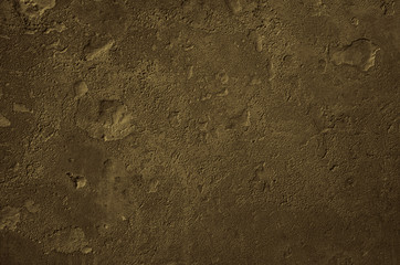 Urban concrete wall background with grooves and bubbles. Cement gray wall. Urban and industrialization art concept. Texture like concrete, stone, cement, plaster.. Poster mockup. Сloseup studio shot.
