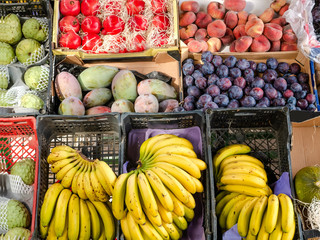 different fresh fruits in a grocery store