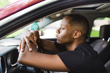 Young man crying with fists clenched