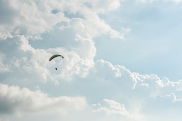 colorful paragliding over blue sky