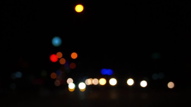 Bokeh lights, road traffic and the city at night