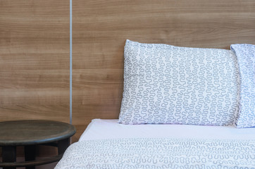 closeup modern white bedroom with bed and pillow clean up comfortable room.