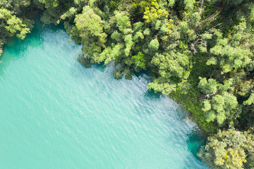 Sun Moon Lake in aerial with forest near the water