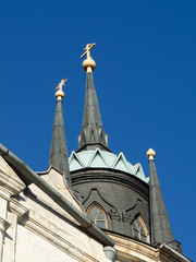 Turrets of Orthodox church of the 18th century. Blue sky background. Pseudo-Gothic style of...