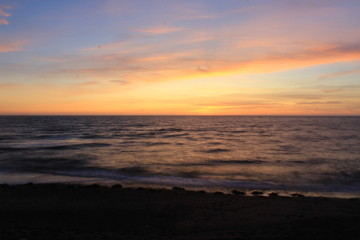 Fototapeta na wymiar Sunset over the sea