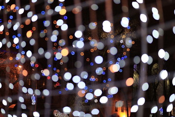 Glitter sparkling abstract bokeh defocused background, celebration