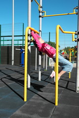 Fototapeta premium Dovochka plays on the cross fit ground