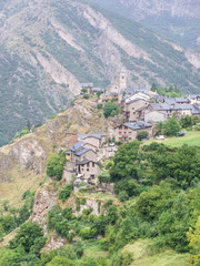 Fototapeta na wymiar Panorama of the small medieval village of Tirvis, in the province of Pallars Sobira, in the Catalan Pyrenees. Catalonia, Spain,