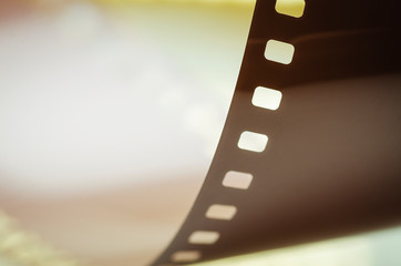 Perforated photographic film abstract close-up, soft focus
