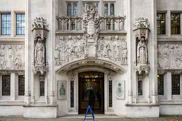 Entrance to the Supreme Court of the United Kingdom, which focuses on cases that are of importance to the general public, like the Brexit ruling, in Parliament Square, London, UK - 291999013