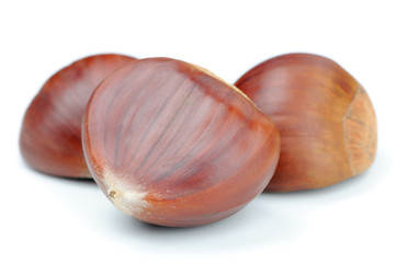 Three Chestnuts Close-Up Isolated on White Background