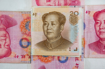 Fototapeta premium Chinese money on a white background. Yuan on the table. Close-up.