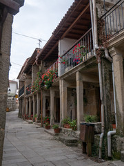 narrow street in the beautiful fishing village of Combarro, north Spain