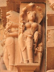 Erotic sculptures and sex poses of man in kajuraho temples, Madhya Pradesh, India. Built around 1050, it is a UNESCO world heritage site, a tourist destination. The concept of textures and postcards.