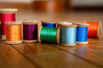 colorful antique spools of thread