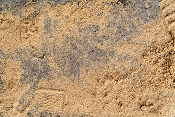 Sand on the ground. Gold and gray color background