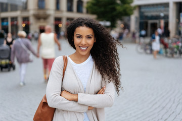 Happy trendy vivacious young African woman