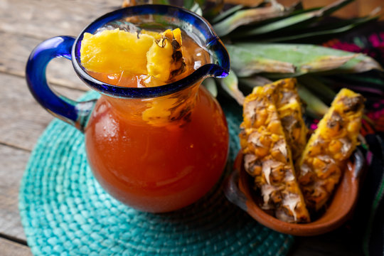 Mexican fermented beverage called tepache made  with pineapple and cinnamon