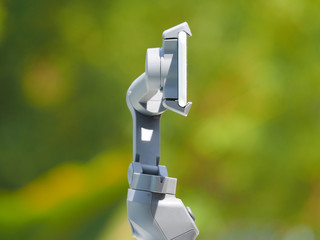 Gimbal stabilizer with cell phone. Gimbal three-axis motorized stabilizer with mounted smartphone....