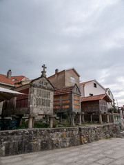 group of traditional granaries or horreos in Combarro, Spain