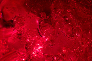 red liquid with bubbles, macro