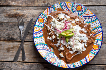 Mexican tacos with beans sauce and fresh cheese also called 