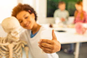 Close up of little hand that holding smartphone