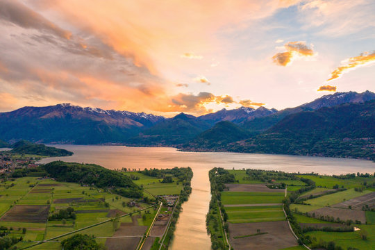 Sunset on river Adda flowing into Lake Como, Lombardy, Italy