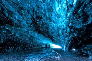 Foto auf Acrylglas Inside glacier ice cave in Iceland © surangaw