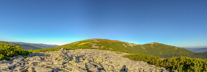 Panorama of rocky mountains in summer