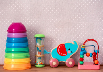 Obraz premium Kids toys on pink background
